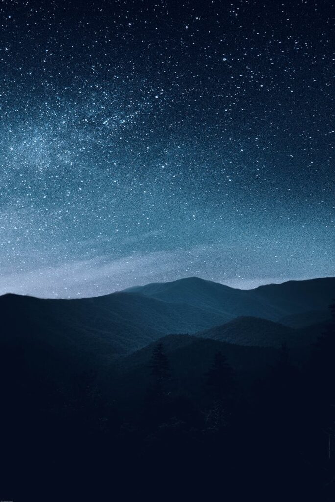 starry sky over mountains